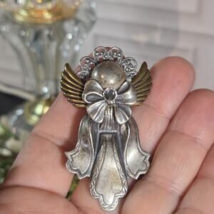 Kat's Creations angel brooch pin with a clear rhinestone accent.